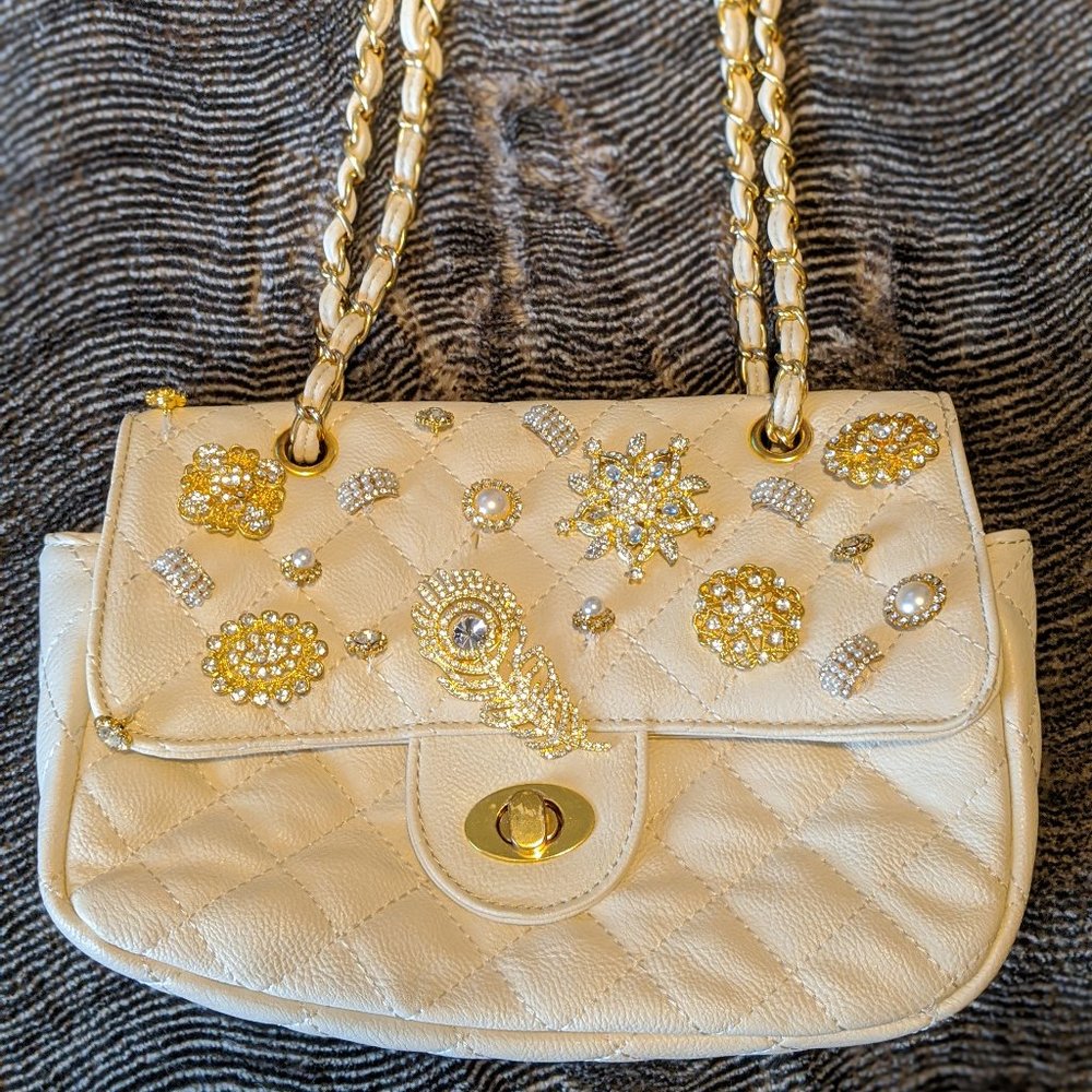 white quilted shoulder - gold embellishments